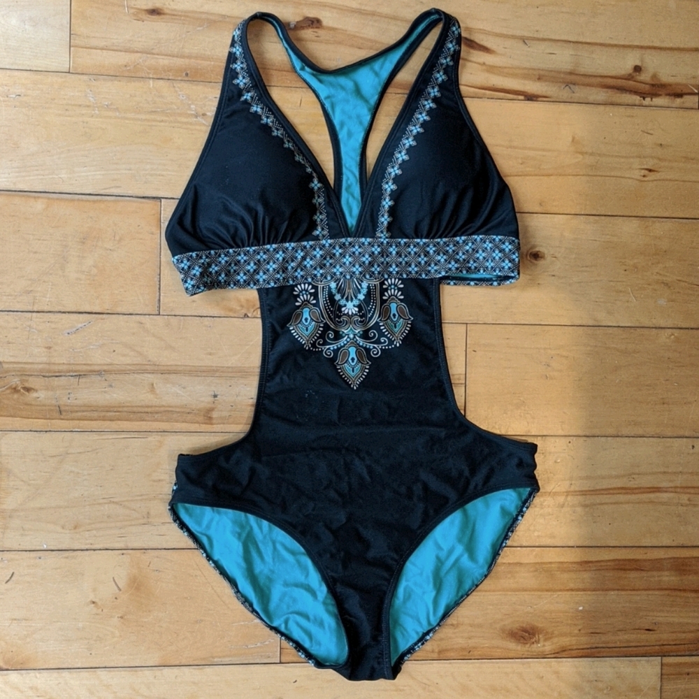 Green and black Athleta cutout one-piece, size L
